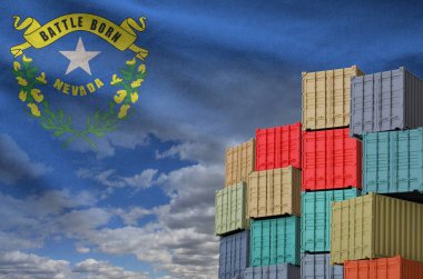 Nevada US state flag and big stack of shipping cargo containers in docks with sky background close up clipart