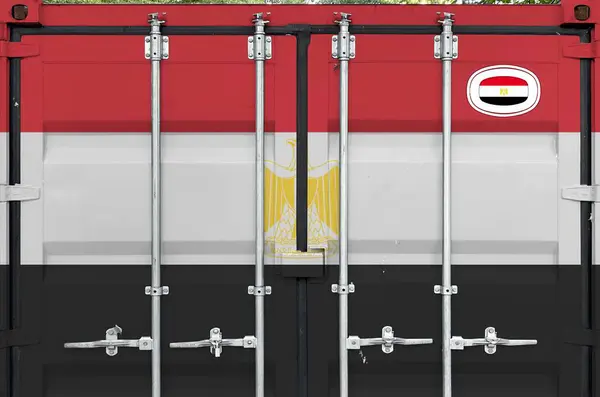 stock image Egypt flag depicted on metal doors of shipping cargo container outdoors in docks area close up