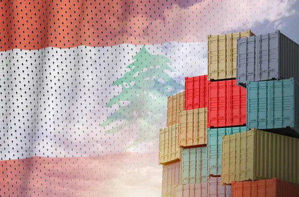 Stock image Lebanon flag and big stack of shipping cargo containers in docks with sky background close up