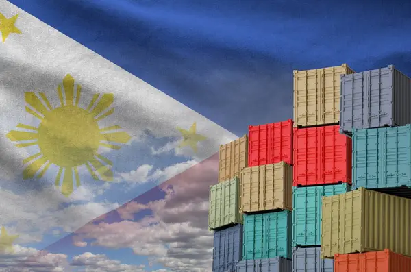 Stock image Philippines flag and big stack of shipping cargo containers in docks with sky background close up