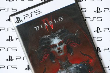 KYIV, UKRAINE - JUNE 26, 2024 Diablo 4 PS5 video game disc box for console gaming. Popular video game disc close up clipart