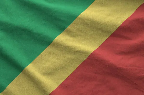 Stock image Congo flag depicted on folded wavy fabric of old cloth close up