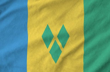 Aziz Vincent ve Grenadines bayrağı eski kumaşın katlanmış dalgalı kumaşında resmedilmiş.