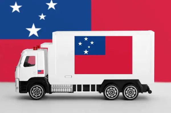 stock image Samoa flag depicted on side wall of white delivery van close up. Shipping and local delivery concept