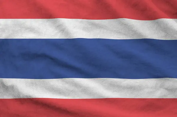 stock image Thailand flag depicted on folded wavy fabric of old cloth close up