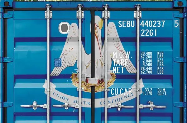 stock image Louisiana US state flag depicted on metal doors of shipping cargo container outdoors in docks area close up