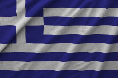 Eski kumaşların katlanmış dalgalı kumaşında Yunanistan bayrağı tasvir edildi