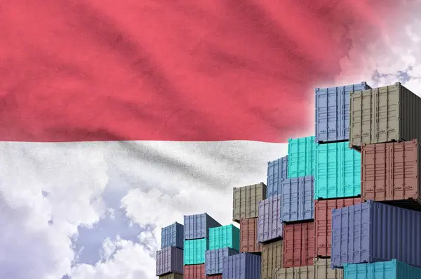 stock image Monaco flag and big stack of shipping cargo containers in docks with sky background close up