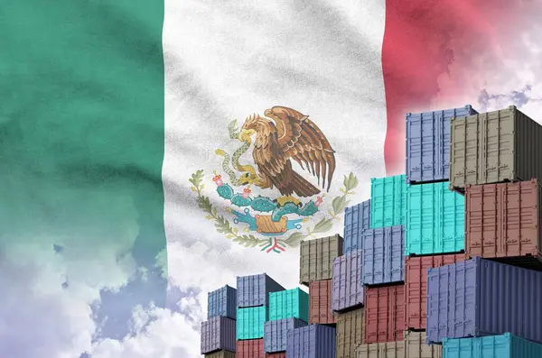 stock image Mexico flag and big stack of shipping cargo containers in docks with sky background close up