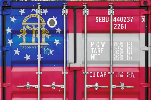 stock image Georgia US state flag depicted on metal doors of shipping cargo container outdoors in docks area close up