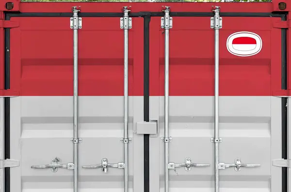 stock image Indonesia flag depicted on metal doors of shipping cargo container outdoors in docks area close up