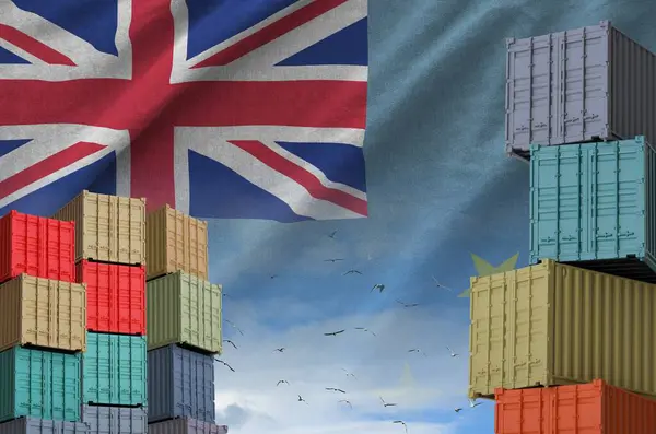 stock image Tuvalu flag and big stack of shipping cargo containers in docks with sky background close up