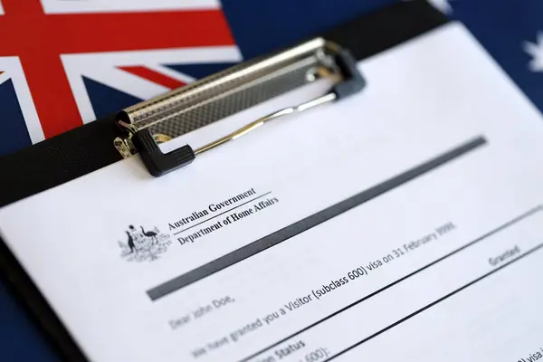 stock image KYIV, UKRAINE - JULY 10, 2024 Application status for Australian visitor visa on table of Australian Government Department of Home Affairs close up