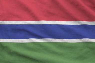 Eski kumaşların kıvrımlı kumaşında Gambiya bayrağı tasvir edilmiştir.