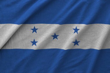 Honduras bayrağı eski kumaşın katlanmış dalgalı kumaşında tasvir edilmiştir.