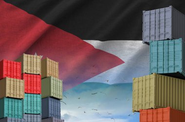 Jordan flag and big stack of shipping cargo containers in docks with sky background close up clipart