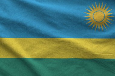 Ruanda bayrağı eski kumaştan katlanmış dalgalı kumaş üzerinde tasvir edilmiştir.
