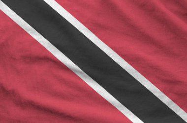Trinidad ve Tobago bayrağı eski kumaşın katlanmış dalgalı kumaşında resmedilmiş.