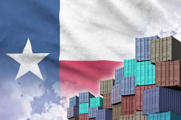 stock image Texas US state flag and big stack of shipping cargo containers in docks with sky background close up