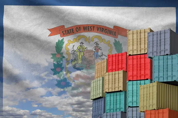 stock image West Virginia US state flag and big stack of shipping cargo containers in docks with sky background close up