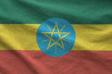 Etiyopya bayrağı eski kumaşın kıvrımlı kumaşında tasvir edilmiştir.