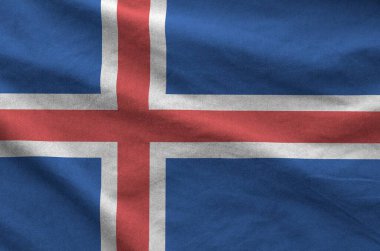 Eski kumaşın kıvrımlı kumaşında İzlanda bayrağı tasvir edilmiştir.