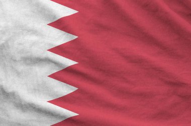 Eski kumaşların kıvrımlı kumaşında Bahreyn bayrağı tasvir edilmiştir.