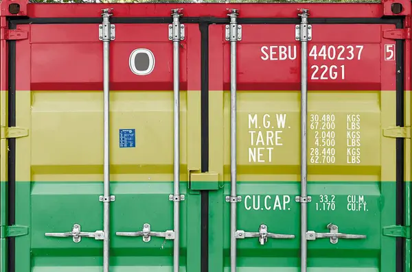 stock image Bolivia flag depicted on metal doors of shipping cargo container outdoors in docks area close up