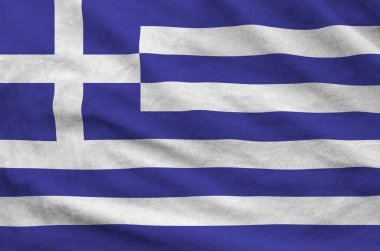Eski kumaşların katlanmış dalgalı kumaşında Yunanistan bayrağı tasvir edildi