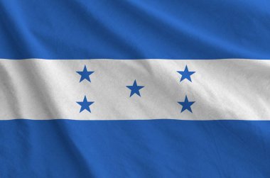 Honduras bayrağı eski kumaşın katlanmış dalgalı kumaşında tasvir edilmiştir.