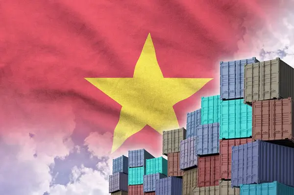 stock image Vietnam flag and big stack of shipping cargo containers in docks with sky background close up