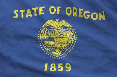 Oregon Amerikan bayrağı eski kumaştan katlanmış dalgalı kumaş üzerine çizilmiş.