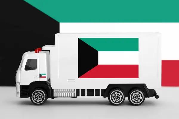 stock image Kuwait flag depicted on side wall of white delivery van close up. Shipping and local delivery concept