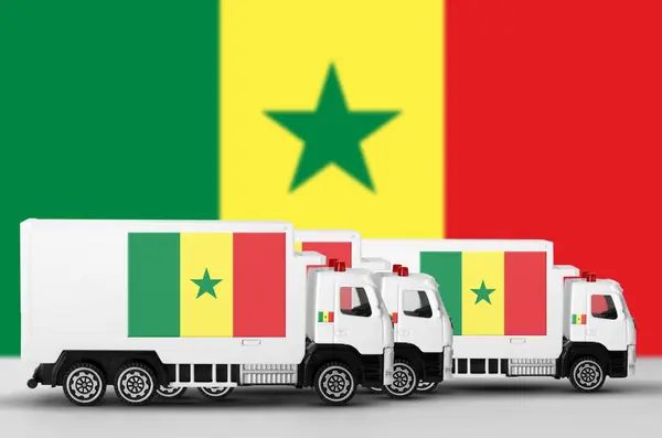 stock image Senegal flag depicted on side wall of white delivery van close up. Shipping and local delivery concept