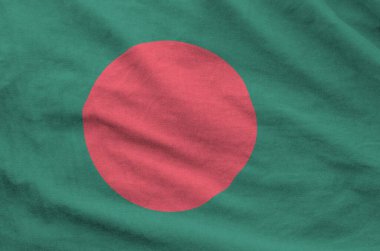 Bangladeş bayrağı eski kumaşın kıvrımlı kumaşında tasvir edilmiştir.