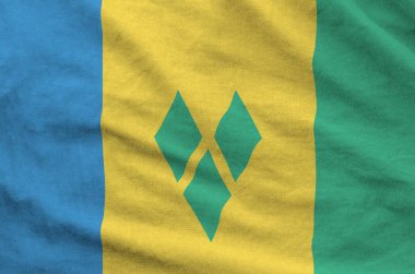 Aziz Vincent ve Grenadines bayrağı eski kumaşın katlanmış dalgalı kumaşında resmedilmiş.