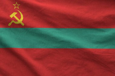 Transnistria bayrağı eski kumaşın katlanmış dalgalı kumaşında tasvir edilmiştir.