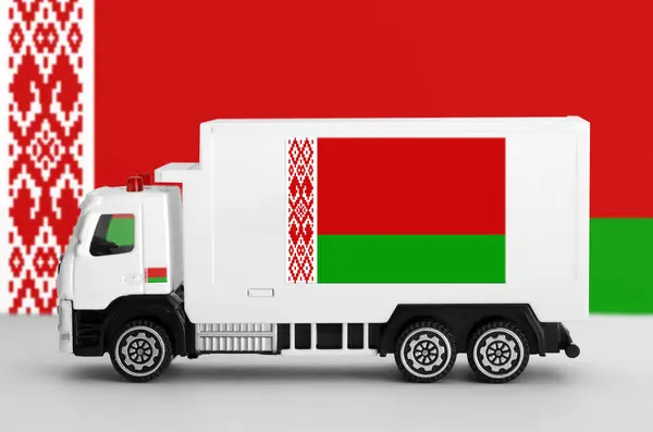 stock image Belarus flag depicted on side wall of white delivery van close up. Shipping and local delivery concept