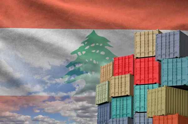 stock image Lebanon flag and big stack of shipping cargo containers in docks with sky background close up