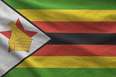 Zimbabwe bayrağı eski kumaşın kıvrımlı kumaşında tasvir edilmiştir.