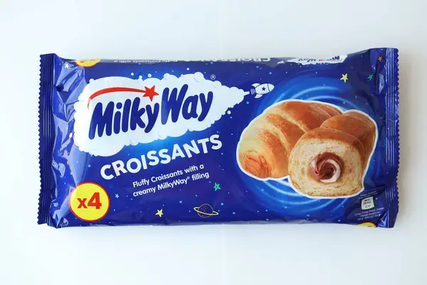 stock image KYIV, UKRAINE - AUGUST 17, 2024 Milkyway croissants in blue wrappings with original logo close up