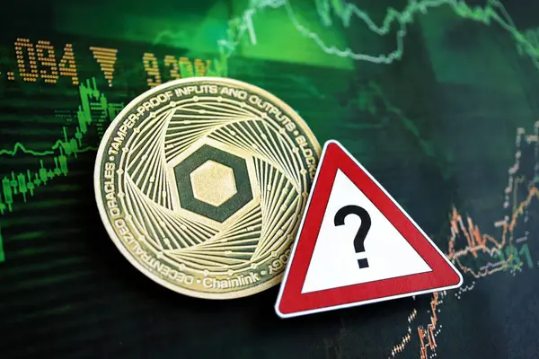 stock image KYIV, UKRAINE - AUGUST 17, 2024 Chainlink LINK coin and red paper question sign on chart background close up