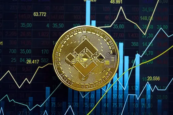 stock image KYIV, UKRAINE - AUGUST 17, 2024 Binance BNB coin on abstract fictional candlesticks in trading chart in blue color close up