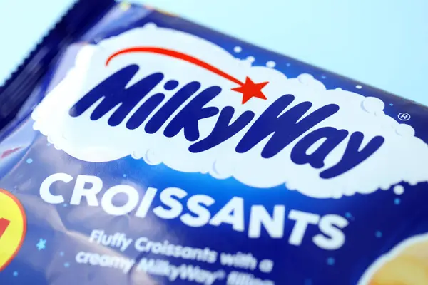 Stock image KYIV, UKRAINE - AUGUST 17, 2024 Milkyway croissants in blue wrappings with original logo close up