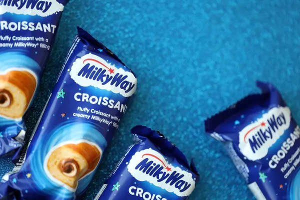 stock image KYIV, UKRAINE - AUGUST 17, 2024 Milkyway croissants in blue wrappings with original logo close up