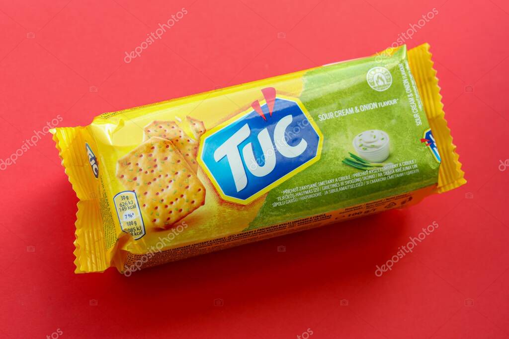 KYIV, UKRAINE - JANUARY 29, 2025 Tuc snack pack on bright flat background. TUC is a brand of snack biscuit marketed by Mondelez International