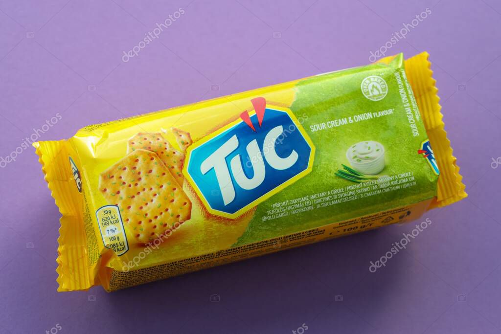 KYIV, UKRAINE - JANUARY 29, 2025 Tuc snack pack on bright flat background. TUC is a brand of snack biscuit marketed by Mondelez International