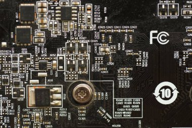 KYIV, UKRAINE - 29 Ocak 2025 Bir video kartı yüzeyi AMD Radeon RX550. Son nesil bir Video Kartın Grafik İşleme Birimi.