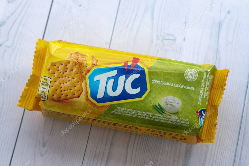 KYIV, UKRAINE - JANUARY 29, 2025 Tuc snack pack on bright flat background. TUC is a brand of snack biscuit marketed by Mondelez International