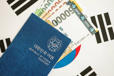Güney Kore büyük miktarda para kazandı ve pasaport Güney Kore bayrağına yakın duruyor. Finans ve bankacılık kavramı